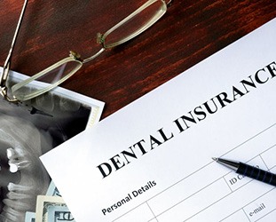 Dental insurance form sitting on a desk