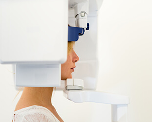 Female patient receiving 3D x-rays