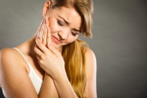 woman with mouth pain