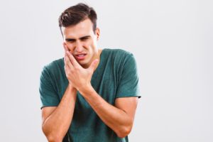 man with mouth pain 