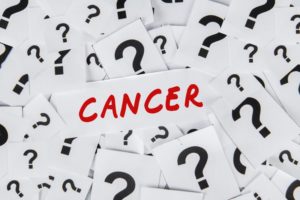 “Cancer” surrounded by question marks — do root canals cause cancer?